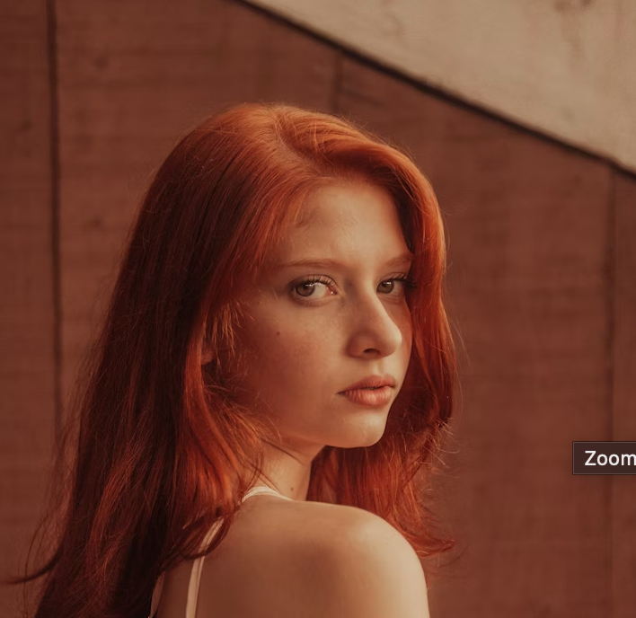 Red-haired woman side profile